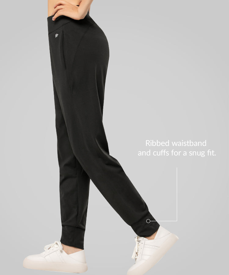 Joggingbyxor med sidfickor och normal passform | Sportbyxor för kvinnor